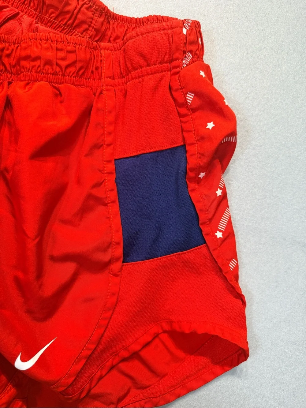 Nike Women's Red Athletic Shorts with Navy Panels and Star Print size S